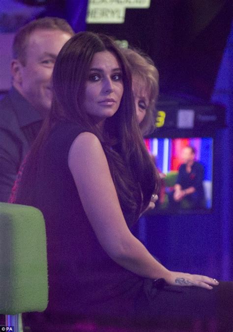 Pregnant Cheryl Is Glued To Her Phone After Showing Off New Figure On