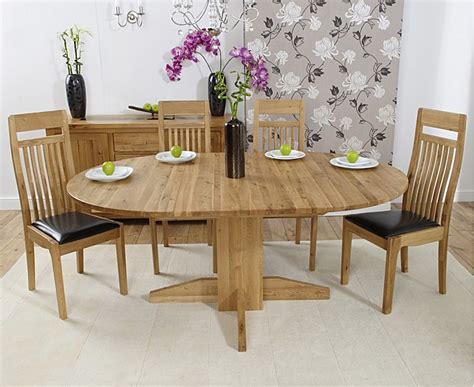 It's crafted from solid american white oak with a swirling natural grain. Dorchester 120cm Solid Oak Round Extending Dining Table ...
