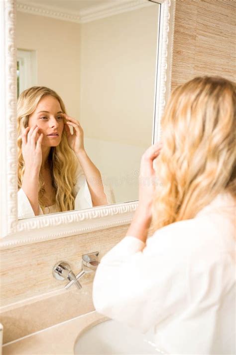 Pretty Woman Looking At Herself In The Mirror Stock Image Image Of Person Touching 67722755
