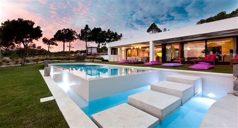 Canouch Is A Luxurious Hilltop Villa Near Cala Jondal With Stylish And