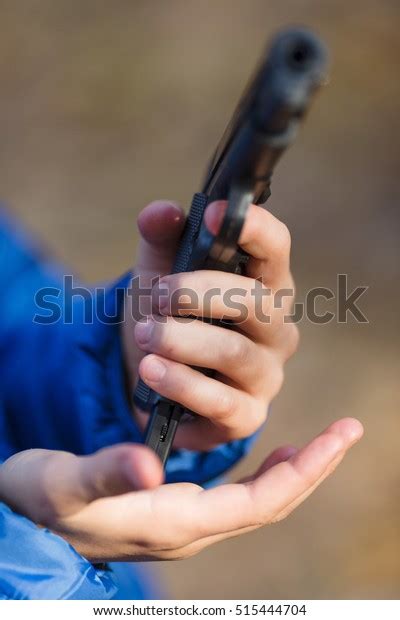 Boy Playing Toy Gun On Street Stock Photo 515444704 Shutterstock