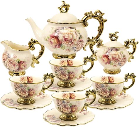What is a cuppa? the set includes a teapot, cups and saucers, a creamer for holding milk, and a sugar bowl, all carried on a tray. Amazon.com | fanquare 15 Pieces British Porcelain Tea Sets ...