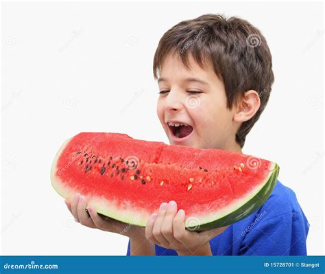 Boy Eating Watermelon In The Garden Royalty Free Stock Image