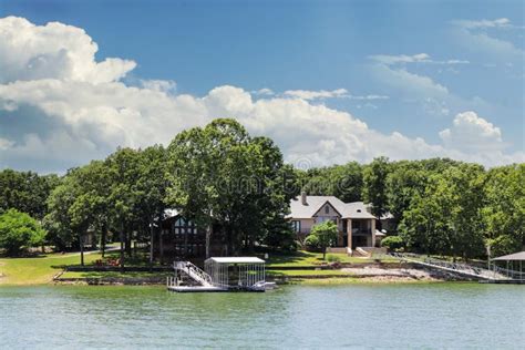 Luxury Houses Built Beside Lake With Docks And Little Beaches Among The