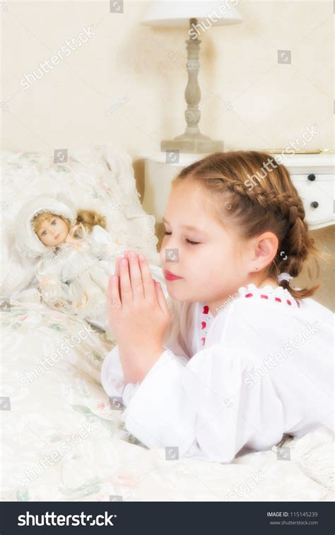 Vintage Little Girl Saying Her Prayers Stock Photo