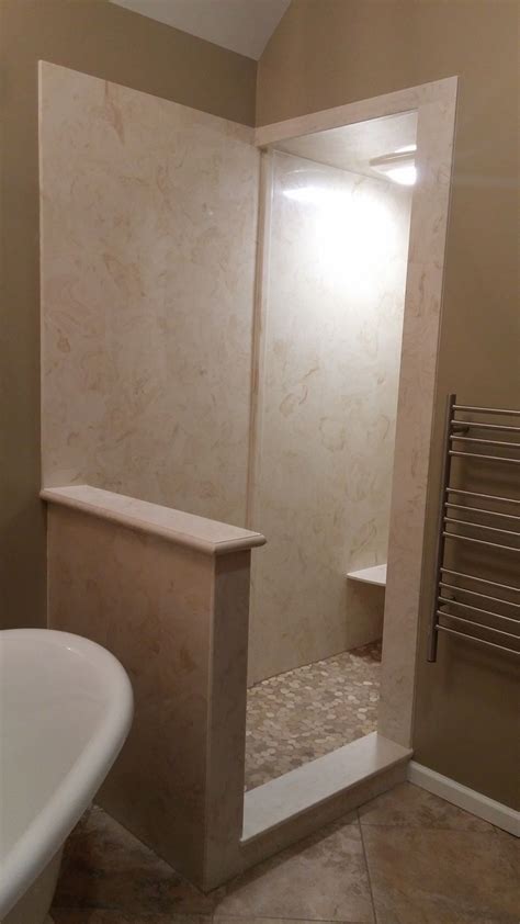 Bob helps install cultured marble panels in a bathroom. Cultured Marble walls and ceiling not only made this shower an easy clean, but gave the ...