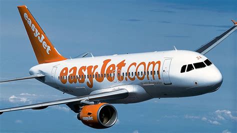 Panic As EasyJet Passenger Tries To Open Door Of Packed Plane At 30