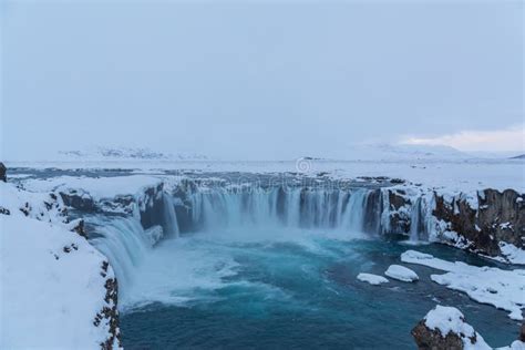 Beautiful Winter Godafoss Waterfall In Iceland Covered In Snow Stock