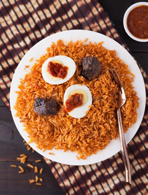 This will result with eggs having hard whites and yolk. How To Cook Jollof Rice With Egg Or Boiled Egg - Nigerian ...