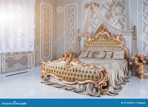 Luxury Bedroom In Light Colors With Golden Furniture Details Big