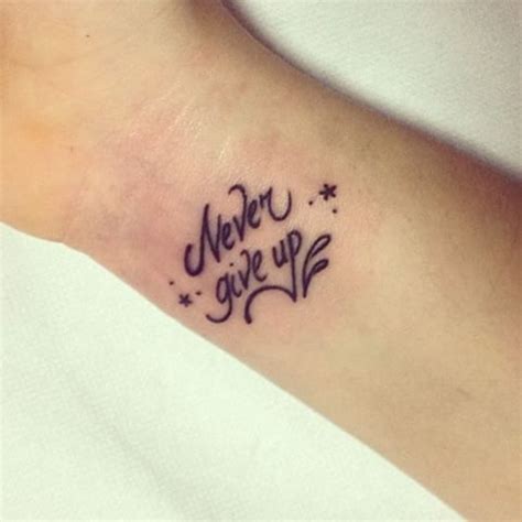 Never give up on yourself tattoo meaning: Never give up tattoo | Wrist tattoos, Word tattoos, Tattoos