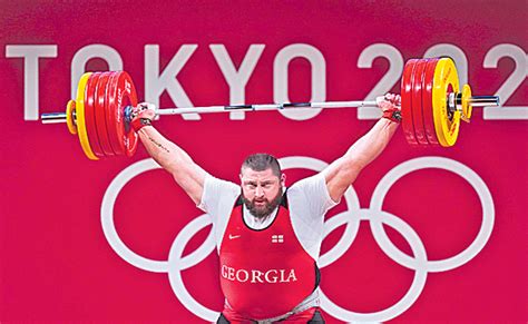 Tokyo Olympics ప్రపంచ రికార్డులను ఎత్తేశాడు Georgian Weightlifter