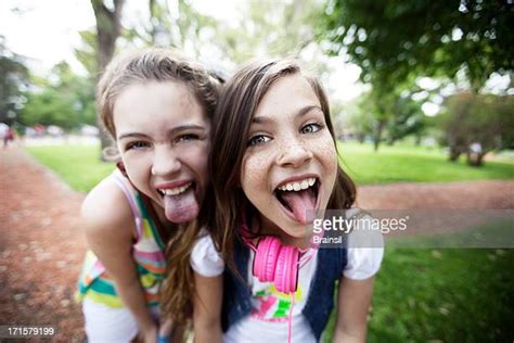 Teenage Girls Tongue Photos Et Images De Collection Getty Images