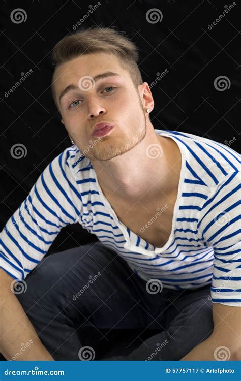 Handsome Young Man Sending A Kiss With His Lips Stock Photo Image