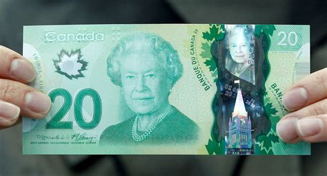 The New Canadian Dollar Bill Made Of Polymer Is Displayed At The