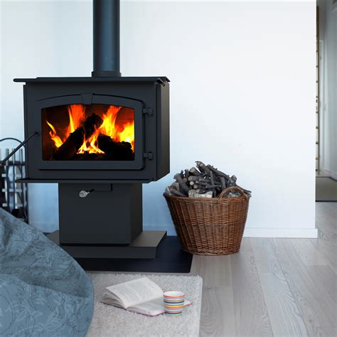 Generally the appliance consists of a solid metal (usually cast iron or steel) closed firebox, often lined by fire brick. Amazon.com: Pleasant Hearth 1,200 Square Feet Wood Burning Stove, Small: Home & Kitchen