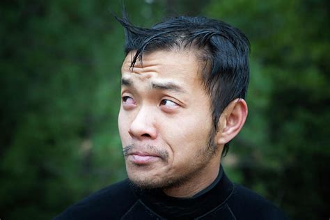 Portrait Of Young Asian Man Photograph By Ron Koeberer Fine Art America