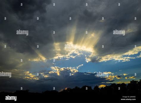 Sun Rays Through Storm Clouds Hi Res Stock Photography And Images Alamy