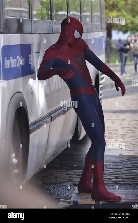 andrew garfield gets into character as he films scenes for amazing spiderman 2 in brooklyn