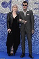 Kelly Osbourne stuns in low-cut black number while joined by boyfriend ...