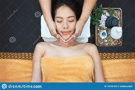 Face Massage Close Up Of Young Woman Getting Spa Massage Treatment At