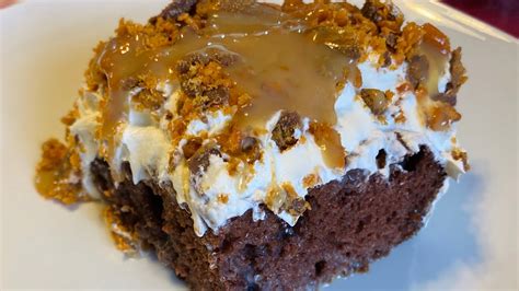 German Chocolate “better Than Sex” Cake Topped With Butterfinger Pieces