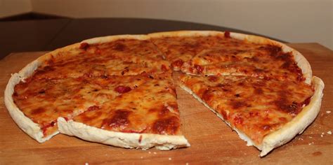 Bake the pizza for 12 minutes. Thin Crust Pizza Dough | Thin Crust Pizza Dough recipe ...
