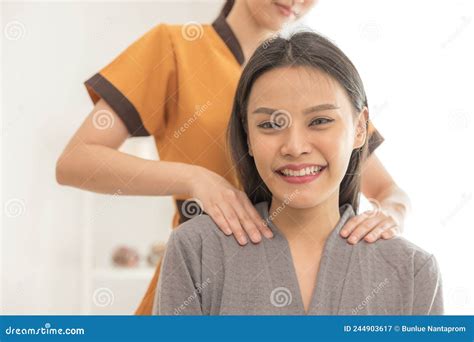 In A Spa Salon A Young Woman Enjoys Massage Therapy Stock Image Image Of Purity Enjoys
