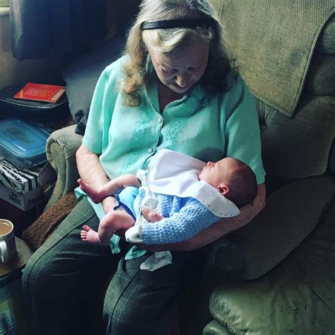 great grandma having her first cuddle with harry greatgra… flickr