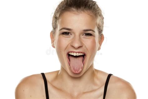 Young Woman With Her Tongue Out Stock Image Image Of Woman Funny