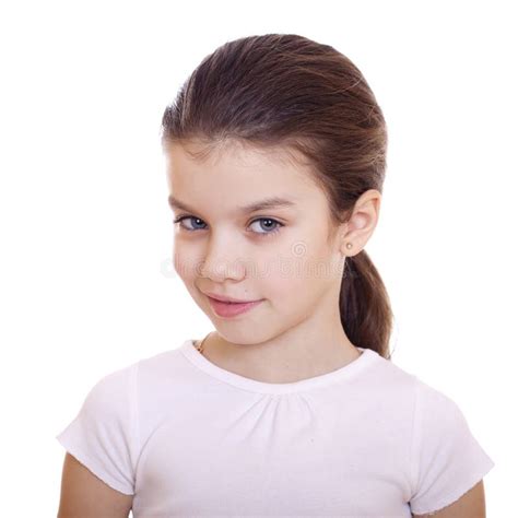 Portrait Of A Charming Little Girl Looking At Camera Stock Photo