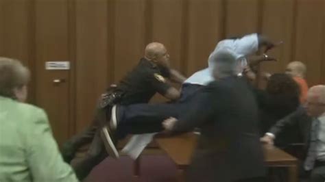 Victims Dad Jumps Over Table To Attack Her Killer In Court