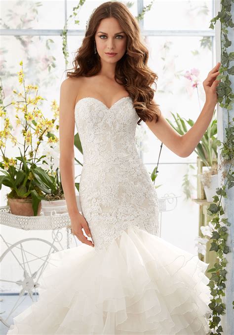 Delicate ties at the waist and shoulders create subtle detailing that is absolutely stunning. Venice Lace on Organza Mermaid Style Morilee Bridal ...