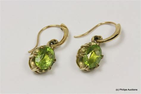 A Pair Of Peridot Short Drop Earrings Ct Yellow Gold Made As