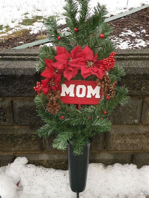 Choose from a large selection of arranged silk flowers including headstone sprays, grave site pillows, memorial wreaths, vase bouquets, floral bushes, and graveside crosses. christmas flowers for cemeteries - Google Search ...