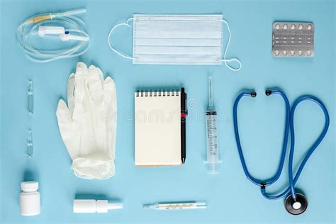 Various Medical Equipment And Notepad On White Background The View