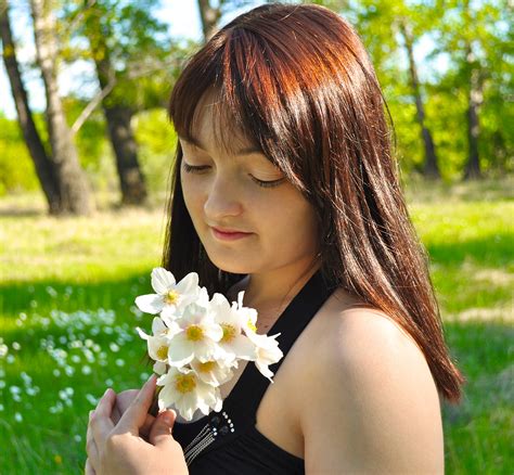 A Girl With White Flowers Free Stock Photo Public Domain Pictures