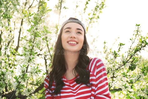 Beautiful Young Woman Near Blossoming Tree On Sunny Spring Day Stock Image Image Of Casual