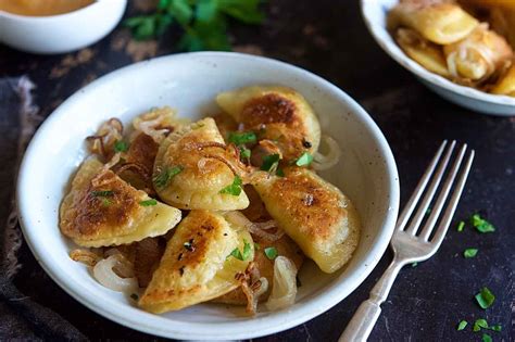 Savory Dumplings Filled With Potato Onion And Cheese These Pierogi