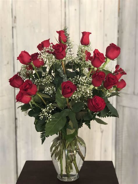 24 Red Roses Arranged With Babys Breath In Waldorf Md