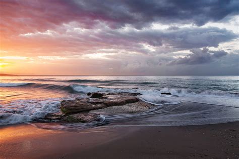 Stormy Orange Beach Sunrise At Playa De La Misericordia Spain Beach