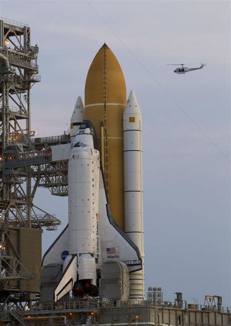 Nasa encounters an emergency with the space shuttle on the launch pad just milliseconds before the solid rocket boosters (srb) ignite. NASA Space Shuttle Atlantis Sits on Launch Pad, Waiting ...