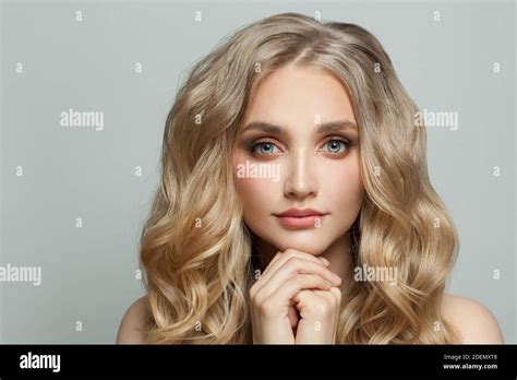 Beautiful Blonde Fashion Model Woman With Wavy Hairstyle Stock Photo
