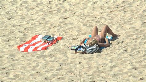 Woman Sunbathing On Bondi Beach Hd Stock Footage Youtube