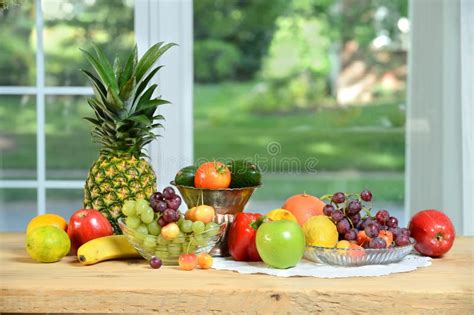 Fruits And Vegetables On Wooden Table Stock Photo Image Of Avocados