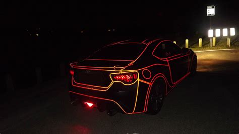 Inspired By Tron He Put Reflective Tape All Over His Car It Looks