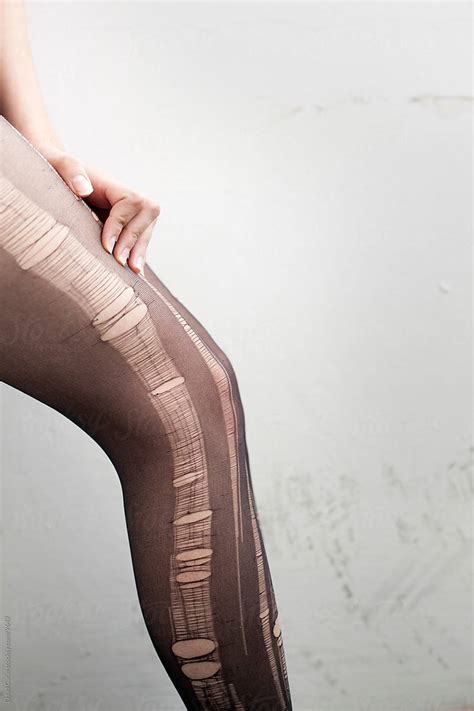 stressed woman torn pantyhose detail del colaborador de stocksy eldad carin stocksy