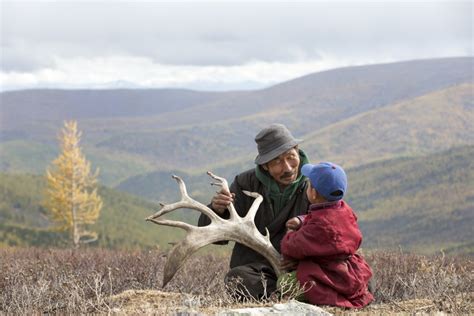 mongolian tsaatan reindeer herder in taiga eternal landscapes mongolia