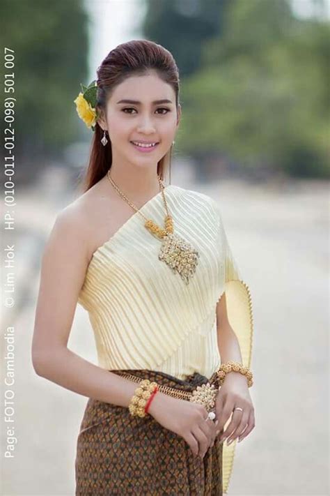 beautiful khmer girl in cambodia traditional costume she smile and looking so cute เสื้อผ้า