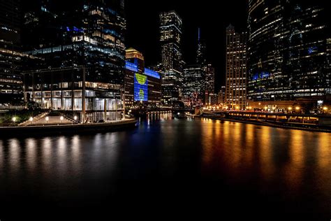 The Colorful Chicago River And Skyline At Night Photograph By Sven